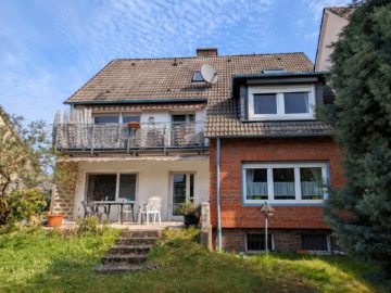 Bild - Solides und gepflegtes Zweifamilienhaus mit ausgebautem Dachgeschoss in Hasbergen