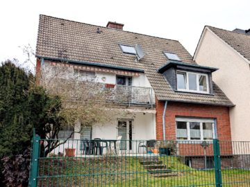 Bild - Solides und gepflegtes Zweifamilienhaus mit ausgebautem Dachgeschoss in Hasbergen
