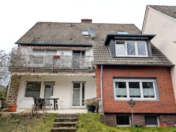 Bild - Solides und gepflegtes Zweifamilienhaus mit ausgebautem Dachgeschoss in Hasbergen