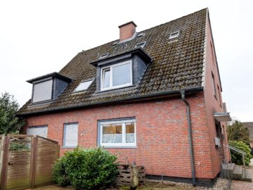 Bild - Solides und gepflegtes Zweifamilienhaus mit ausgebautem Dachgeschoss in Hasbergen