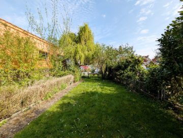 Bild - Solides und gepflegtes Zweifamilienhaus mit ausgebautem Dachgeschoss in Hasbergen