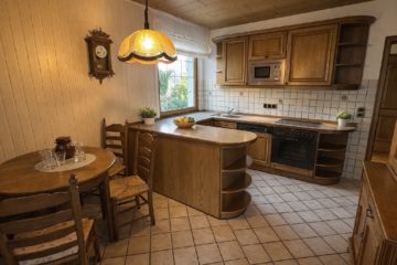 Die Küche bietet eine geräumige Aufteilung - Ein Zuhause mit viel Platz im Herzen von Belm