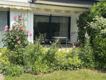 Teilweise überdachte Terrasse - Nähe Lotter Straße: ETW mit Terrasse, Garten und Garage