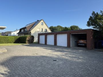 Bild - Solides Zweifamilienhaus mit 4 Garagen und Ausbaureserve im Dachgeschoss