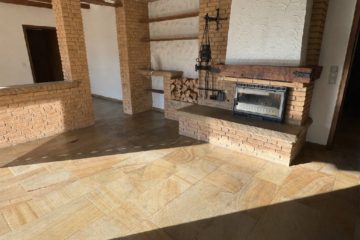 Liftdurchflutetes Kaminzimmer mit Terrassenzugang - Großzügiges Wohnhaus mit ELW in bester Feldrandlage von Belm